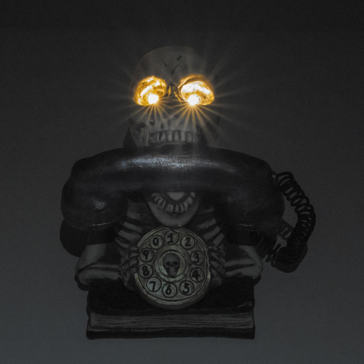 Téléphone Cranium en résine lumineux